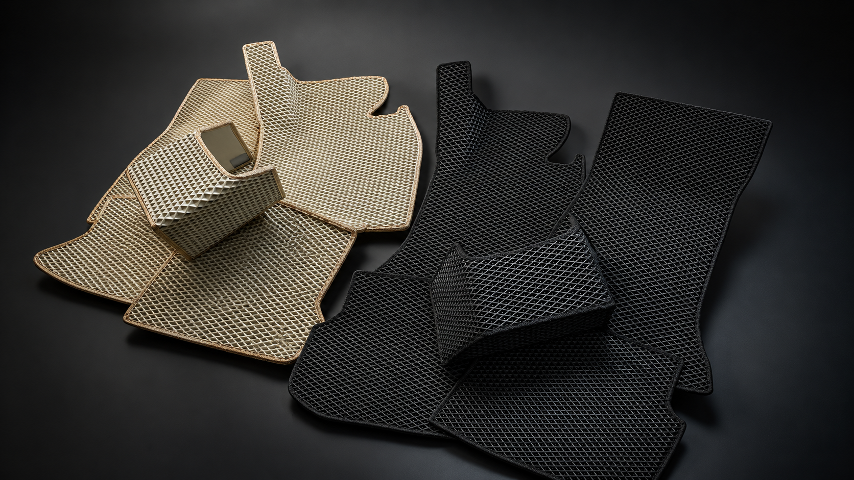 Two complete sets of EVA car mats — beige with cream trim and black on black