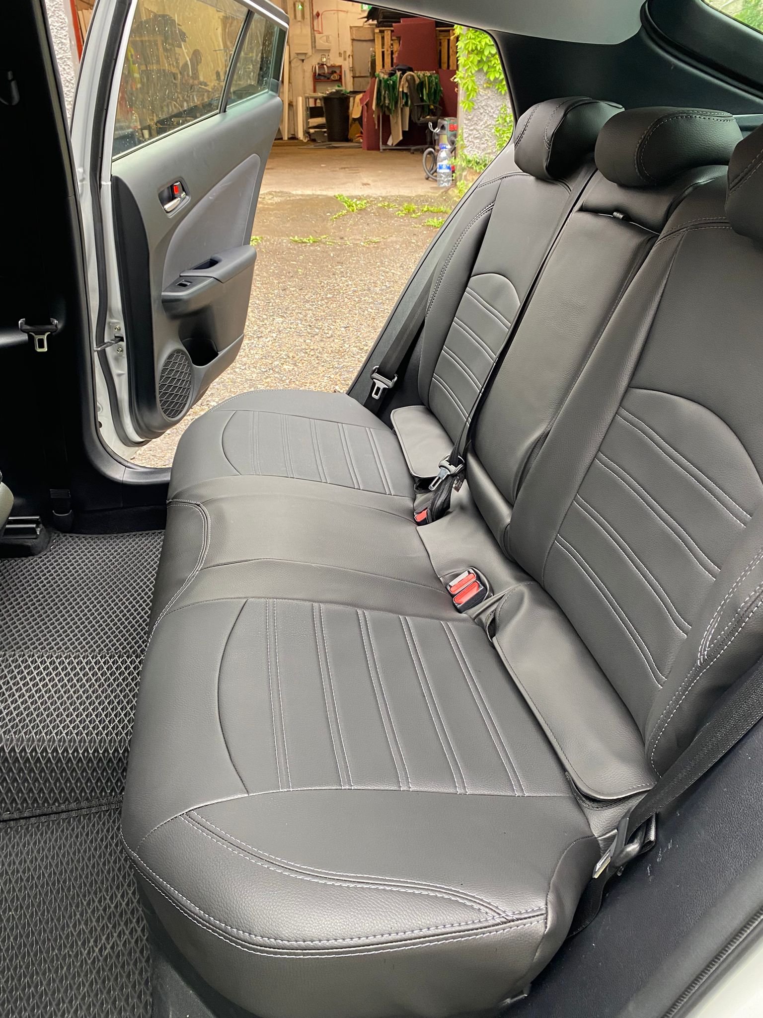 Before — original worn seat fabric